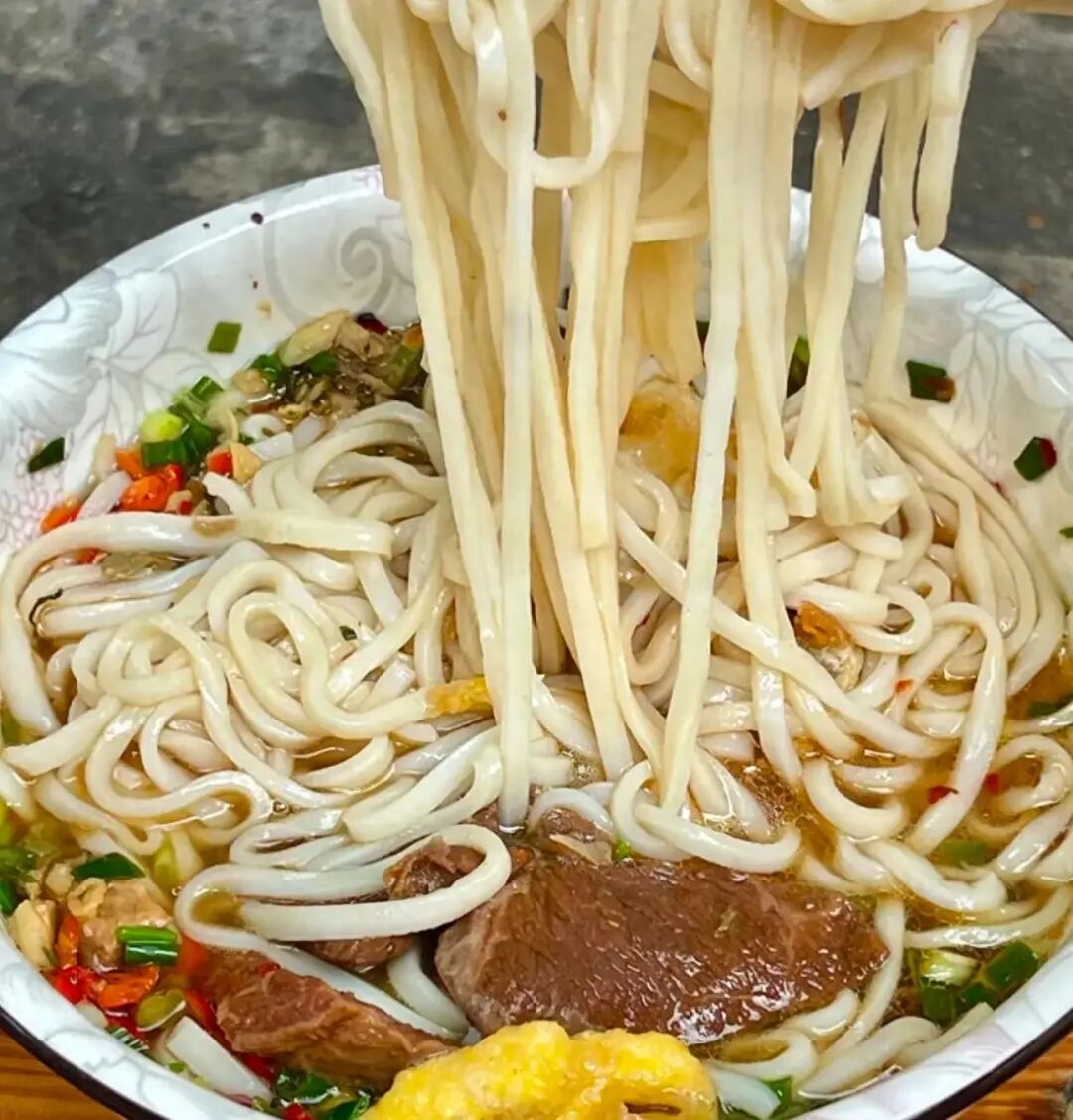DƬ